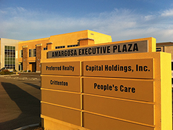 Monument sign in front of Amargosa Executive Plaza